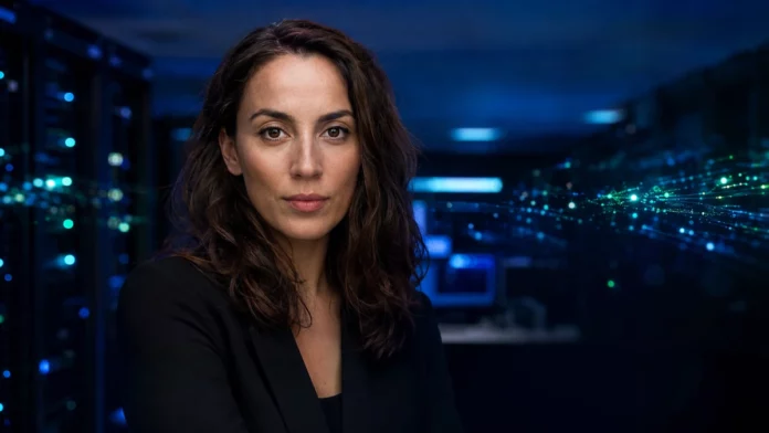 Mira Murati CEO of Thinking Machines Lab in a dark server room with blue and green data stream particles in the background